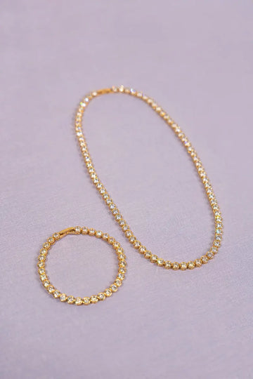 LOTT GIOIELLI-GOUDKLEURIGE ARMBAND FRAMED ROUND CRYSTALS